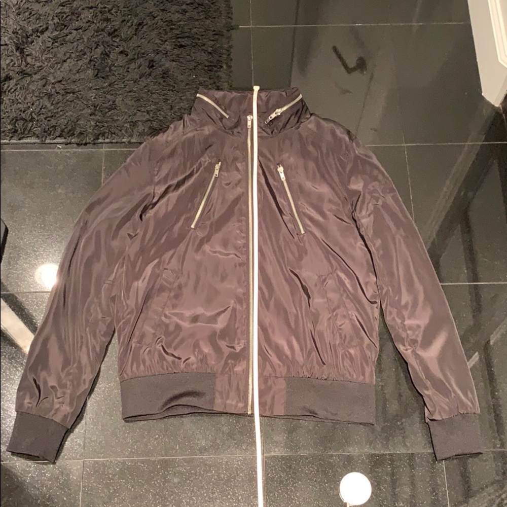 Black windbreaker with silver zipper jacket